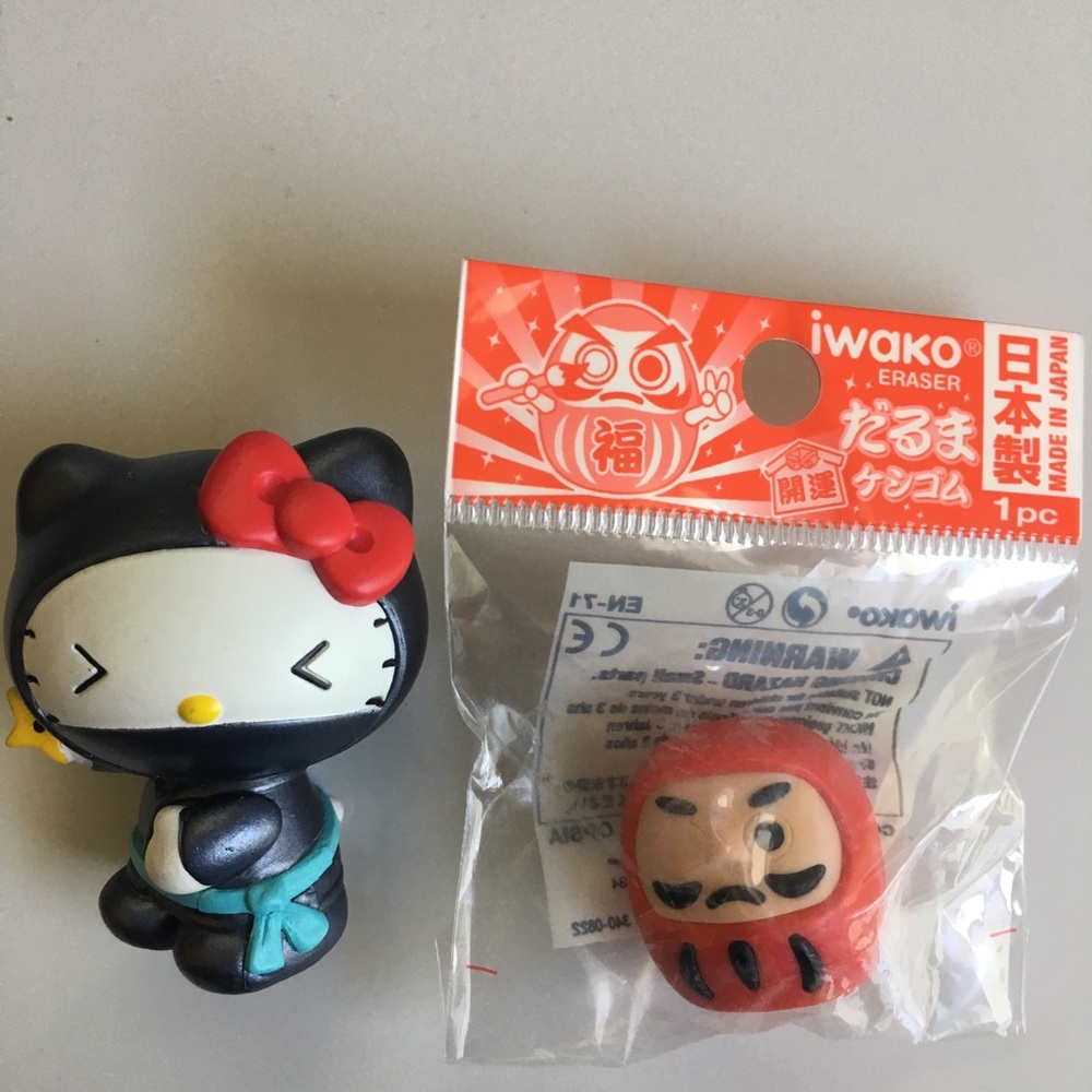Hello Kitty figurine and Daruma eraser